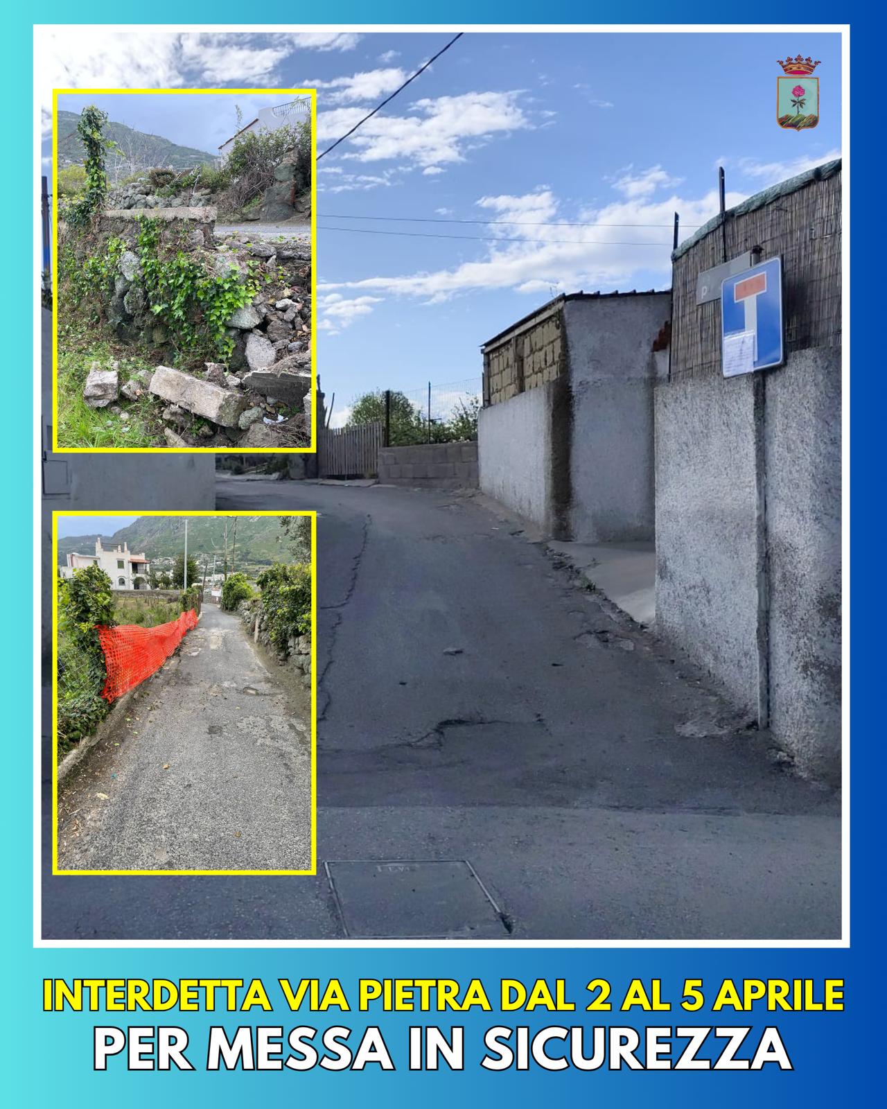 Fotografia di via Pietra e del muro crollato